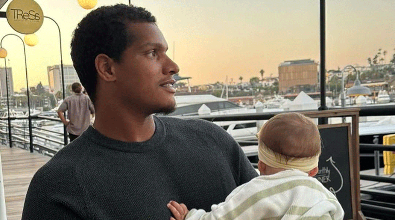 isaac rochell and his baby daughter