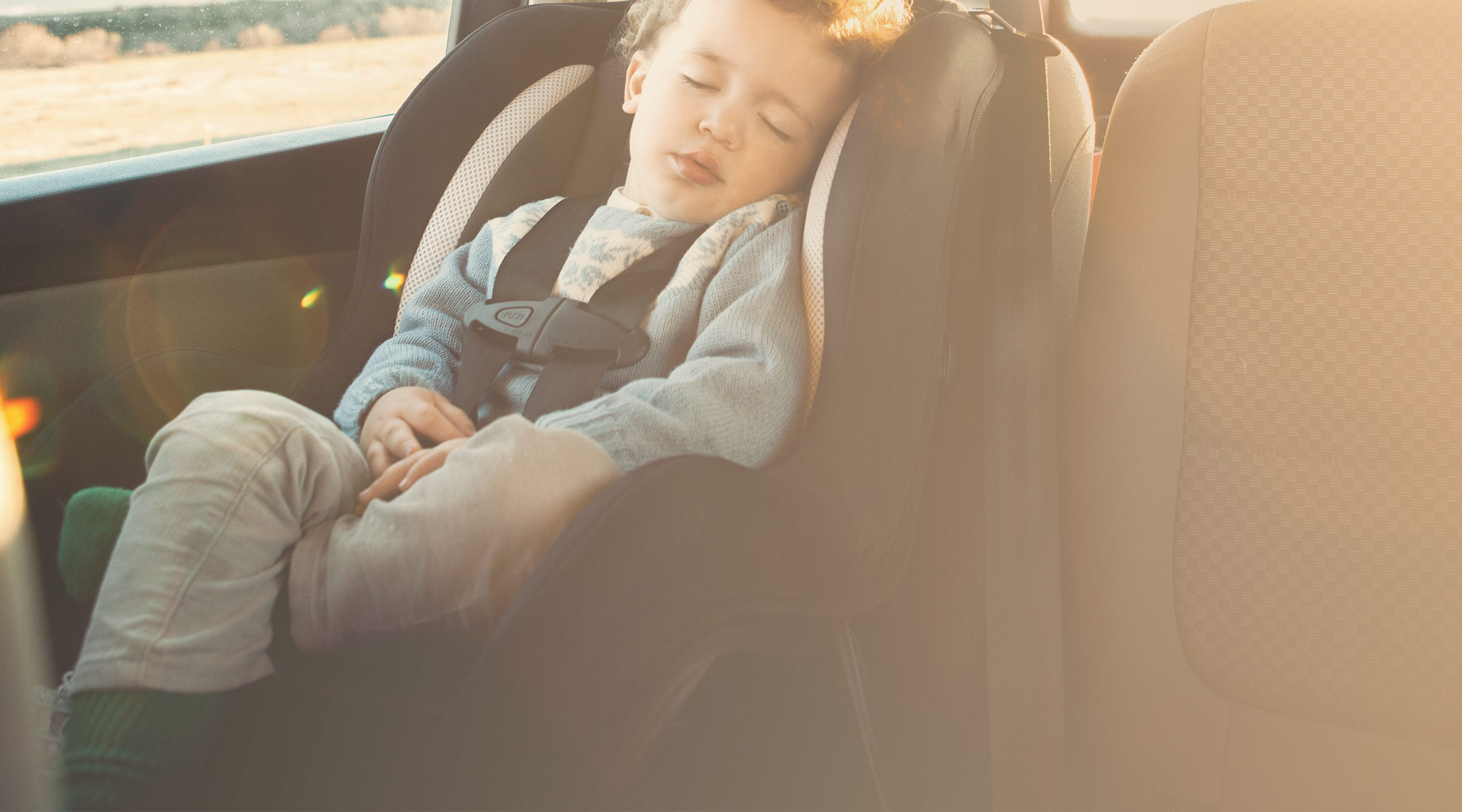 toddler sleeping in hot car