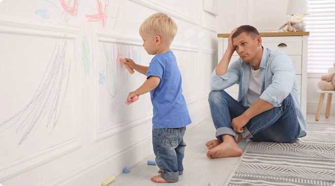 father watching toddler draw on the walls FAFO parenting style
