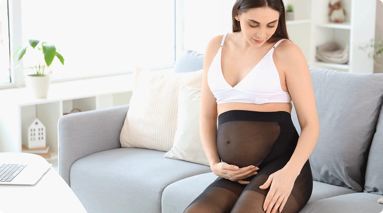 pregnant woman wearing black tights