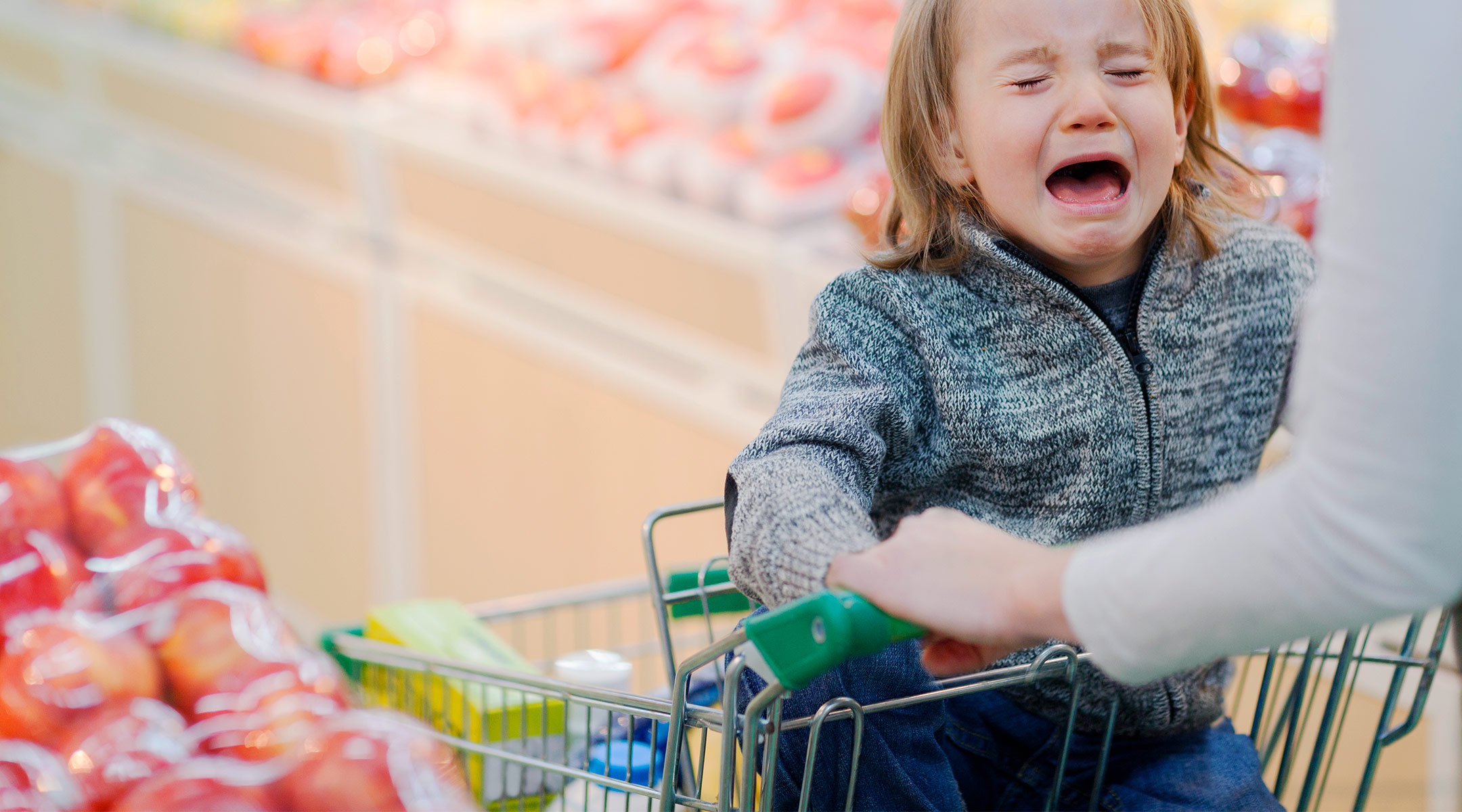 toddler having a tantrum in the grocery store