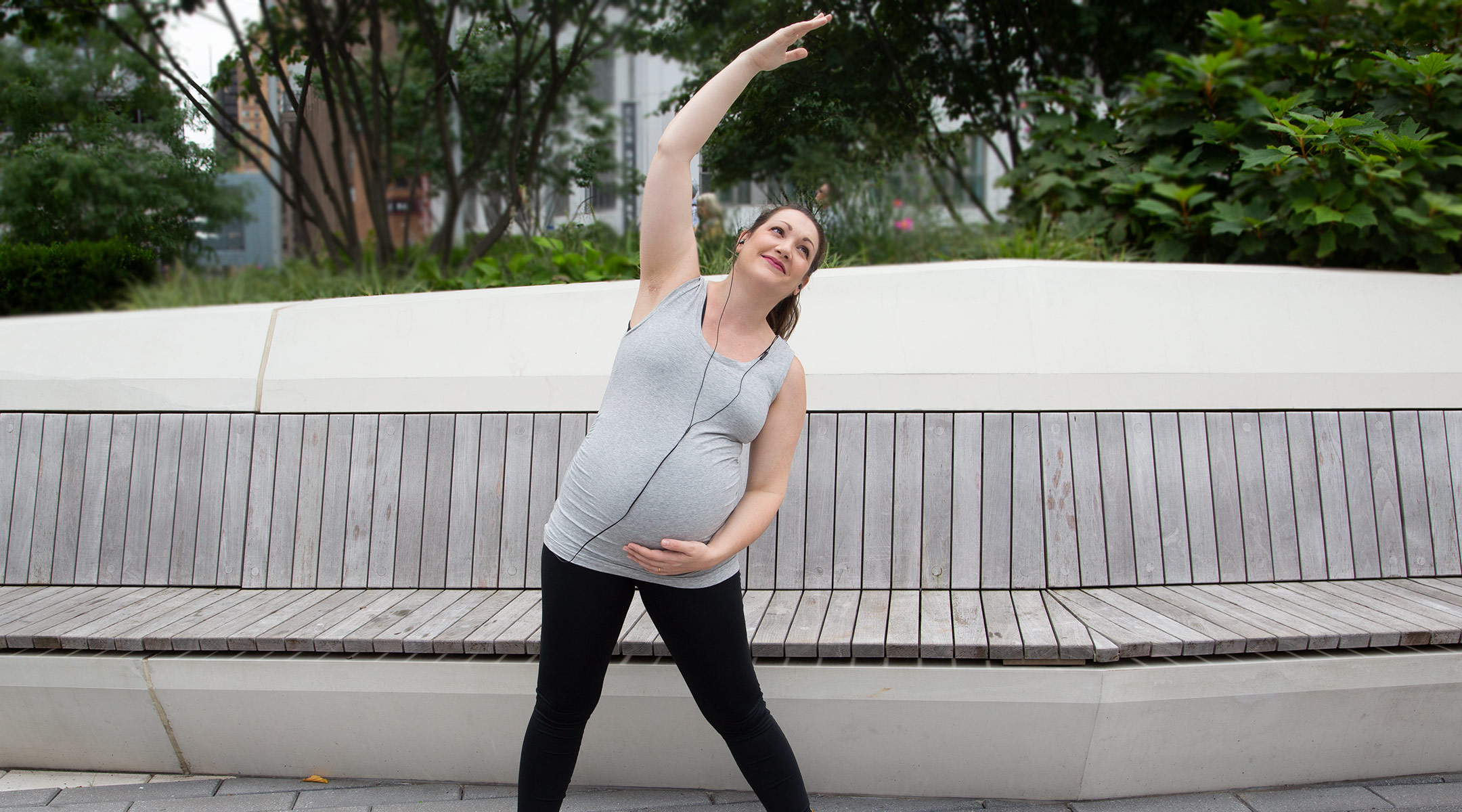 pregnant woman in fitness clothes 