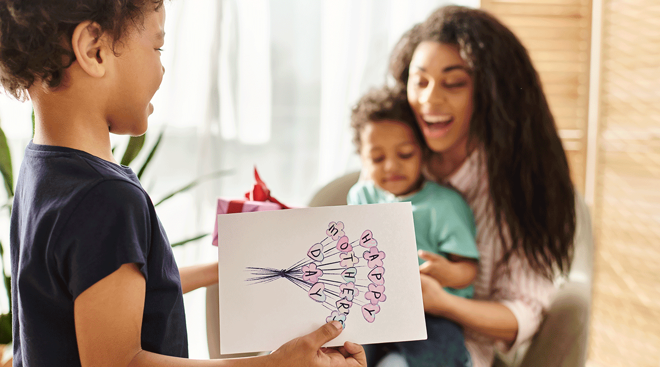 toddlers giving mom gifts for mother's day