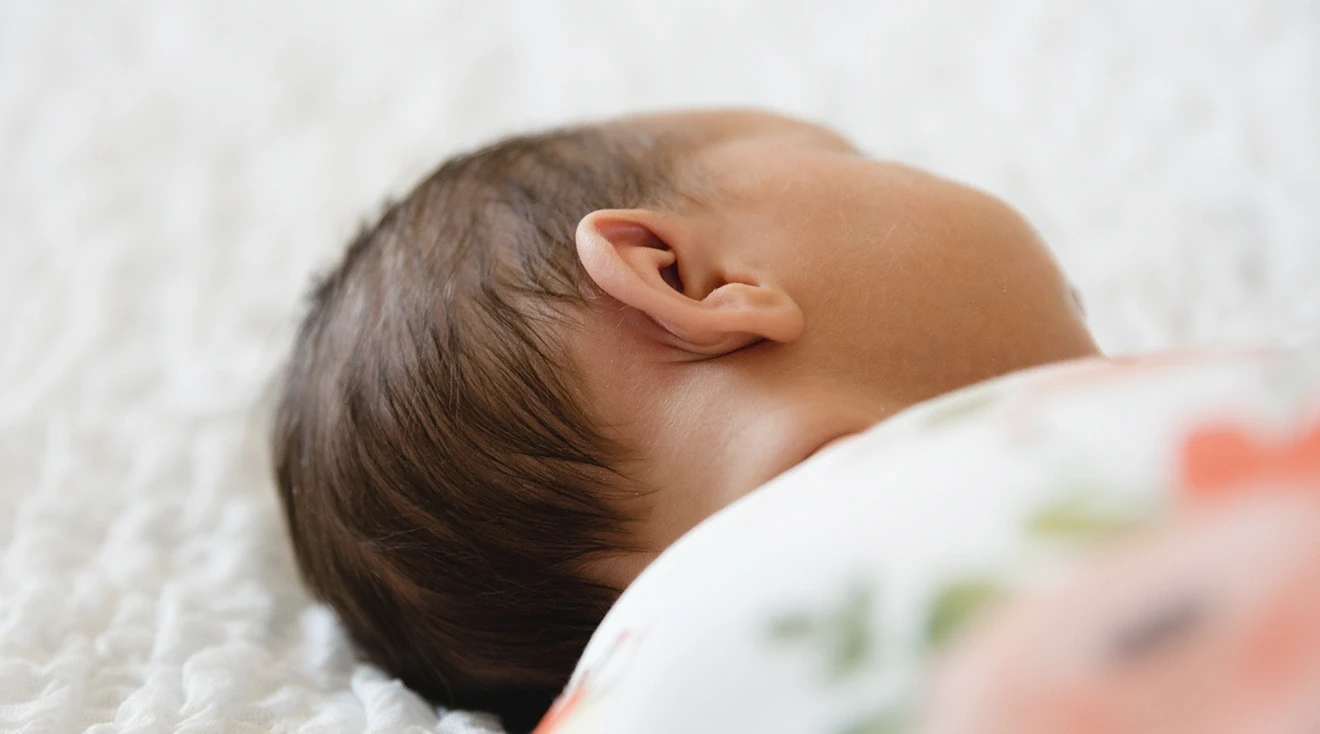 sleeping newborn baby