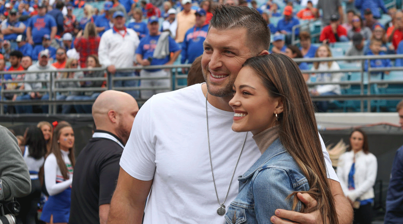 Former Florida Gators quarterback and Tim Tebow poses for a photo with Demi-Leigh Nel-Peters during the game between the Georgia Bulldogs and the Florida Gators on November 2, 2019 at TIAA Bank Field in Jacksonville, Fl