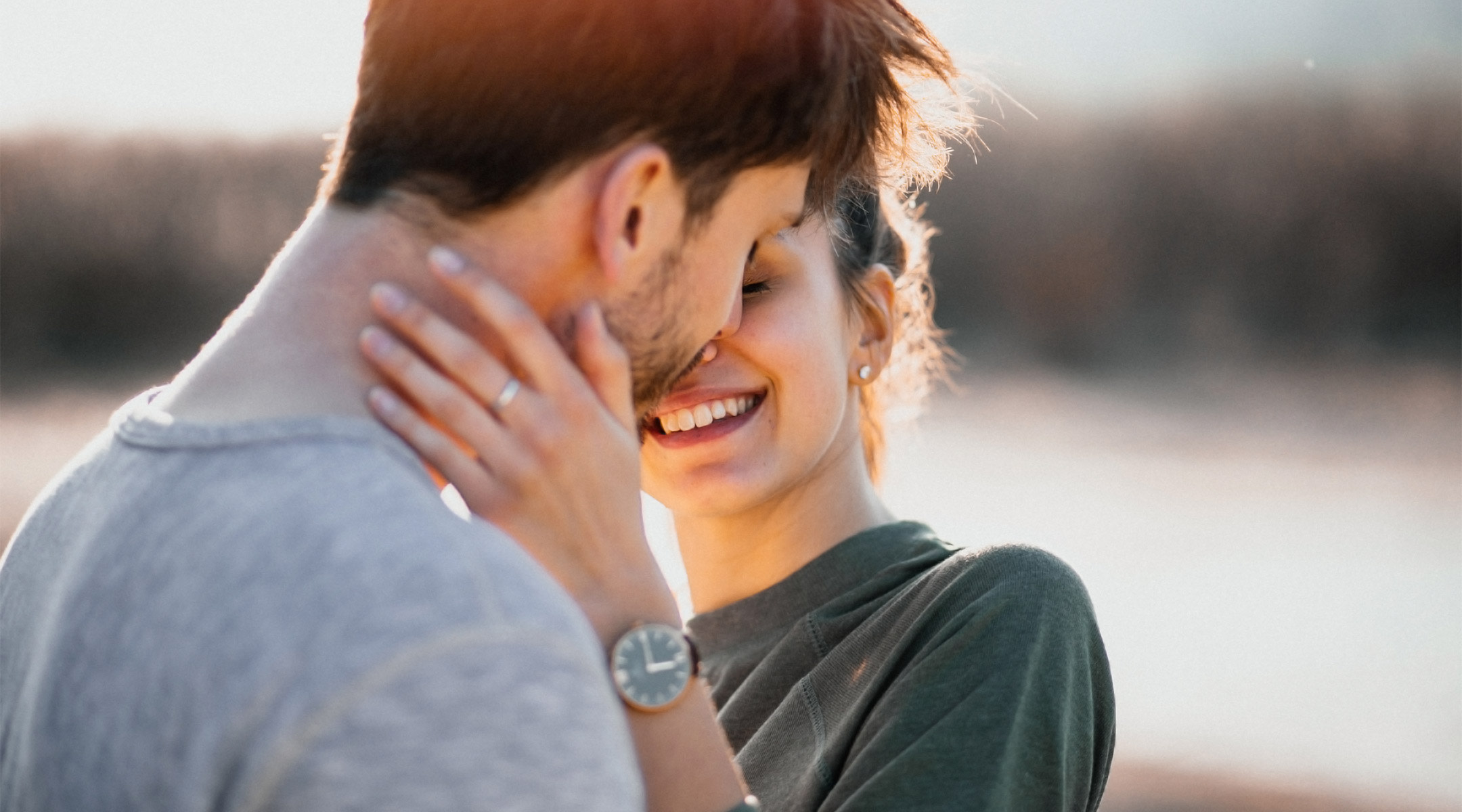 close-up of couple embracing