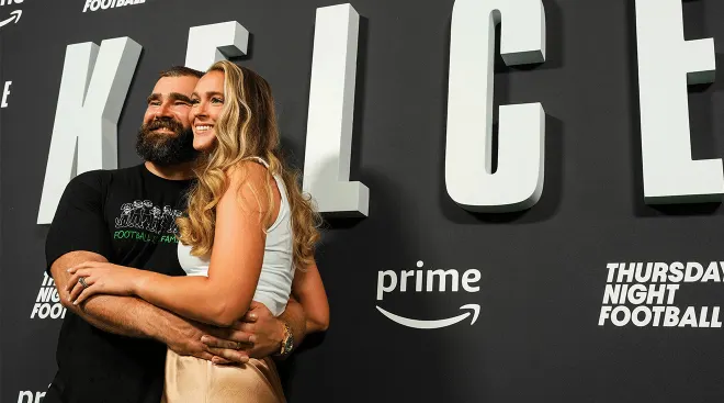 Jason Kelce poses for a photo with Kylie Kelce during the Kelce documentary premiere at Suzanne Roberts Theater on September 8, 2023 in Philadelphia, Pennsylvania