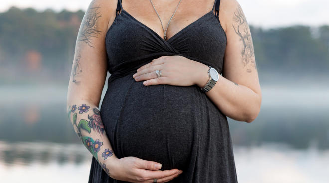 pregnant woman thinking about body image