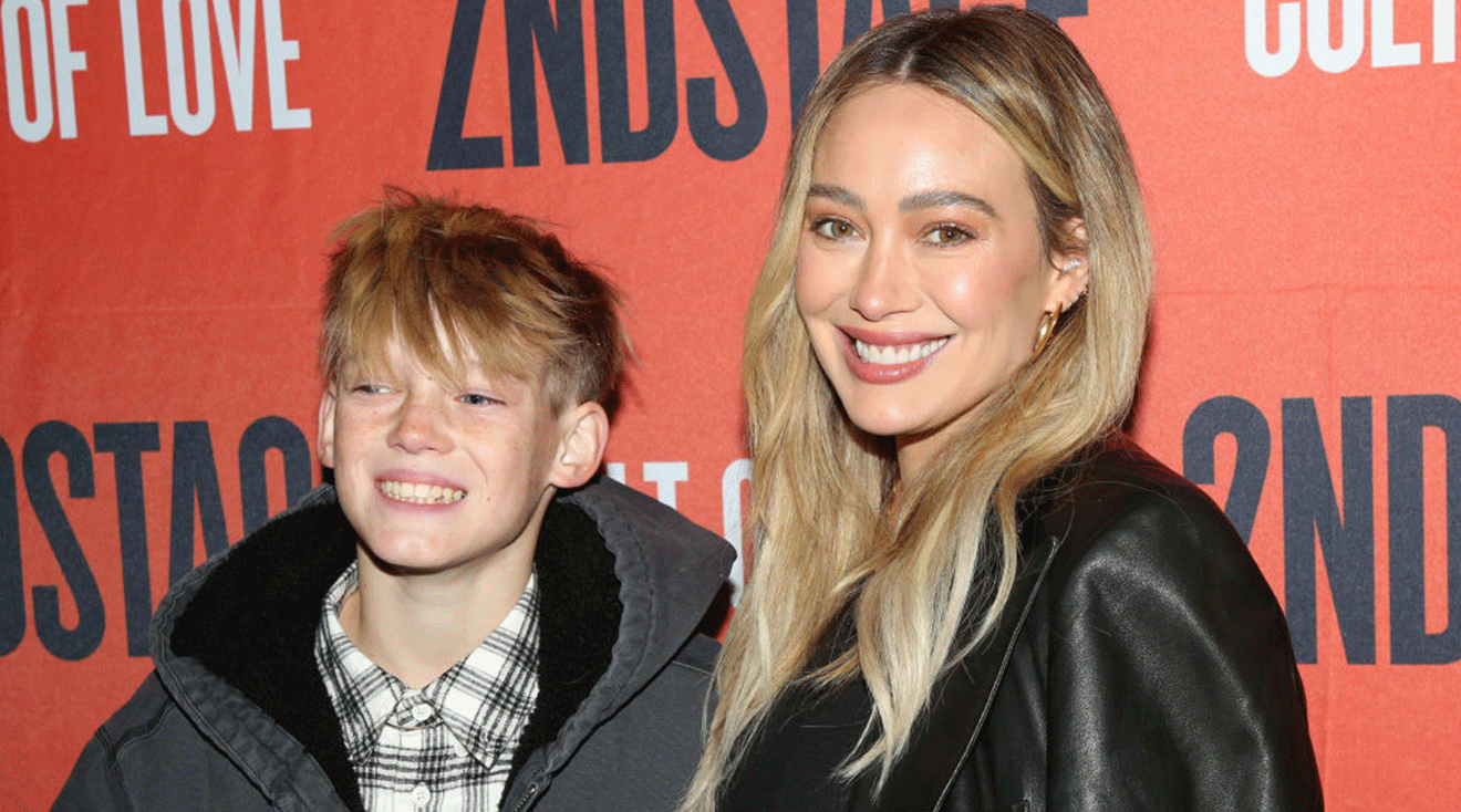 Luca Comrie and Hilary Duff pose at the opening night of Second Stage Theatre's new play "The Cult of Love" on Broadway at The Hayes Theater on December 12, 2024 in New York City