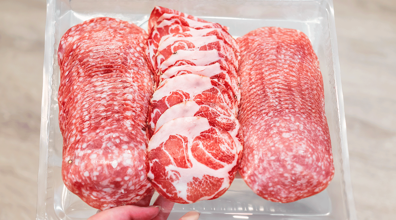 charcuterie meats in plastic container
