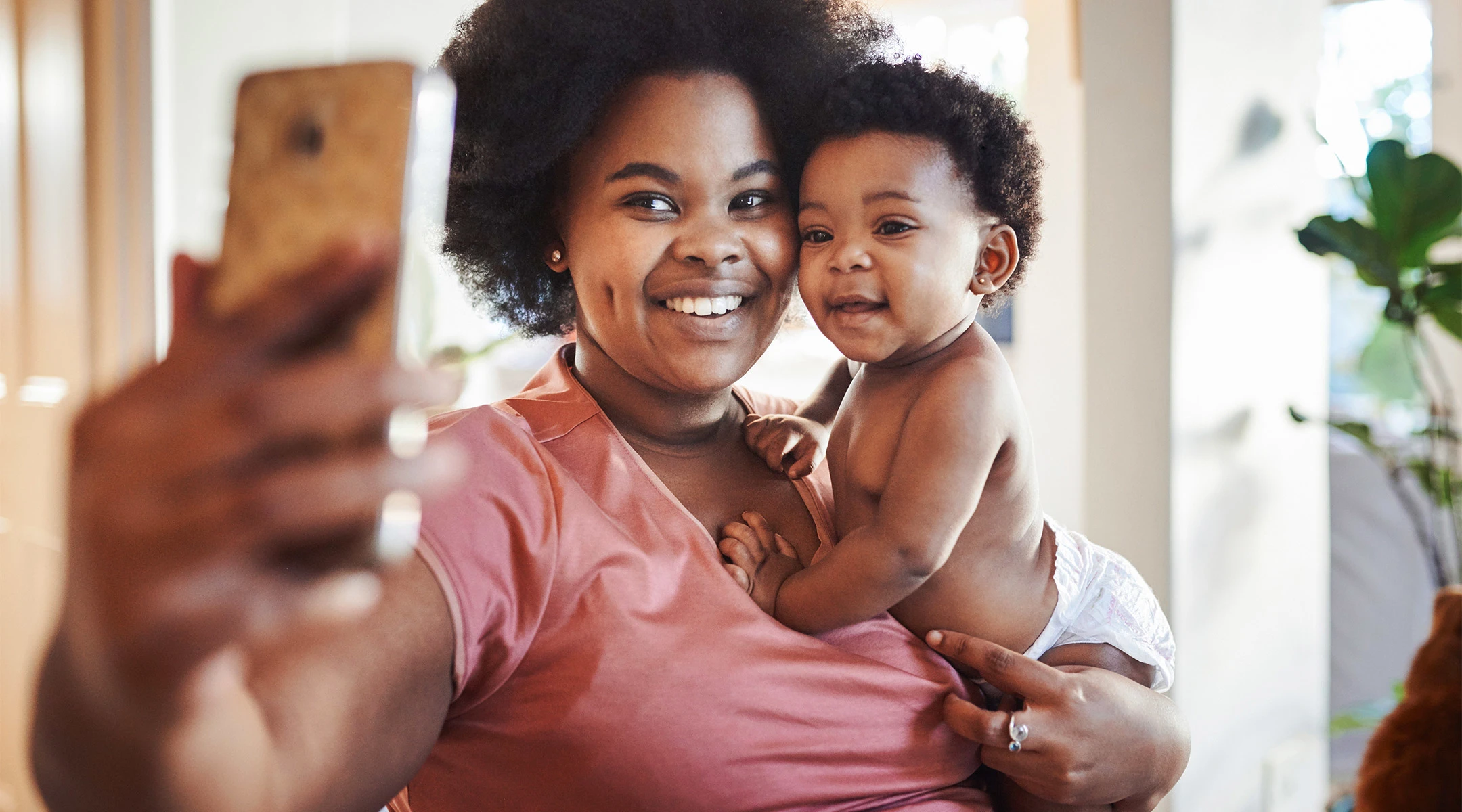 mom taking selfie with her baby