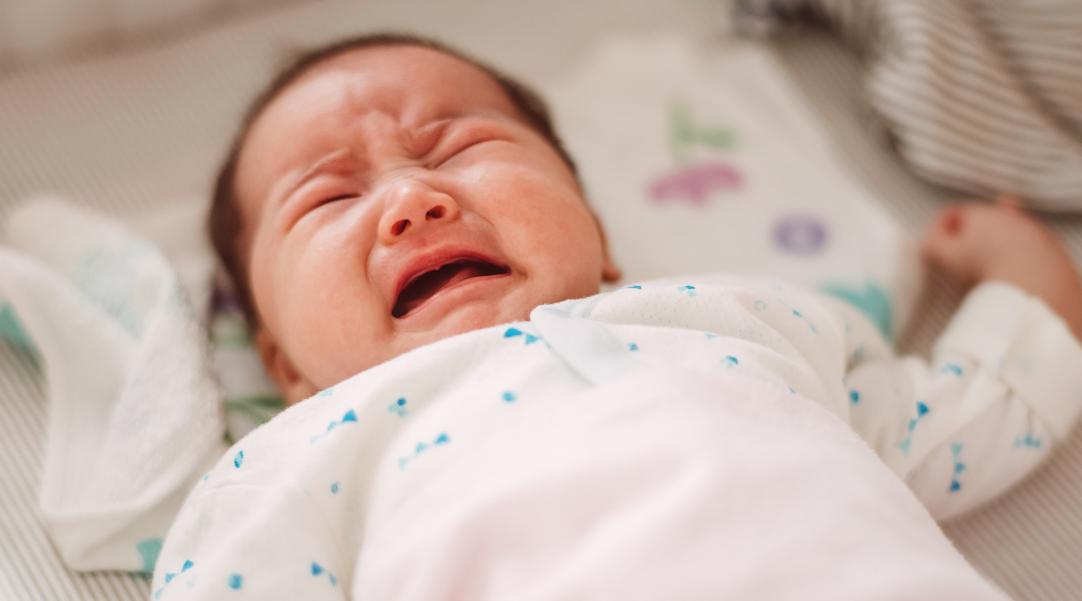 Baby crying; woman pours water on 9-month-old as payback for waking her up. 