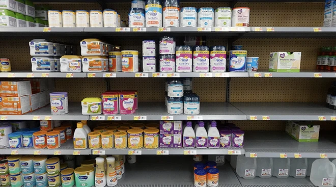 baby formula on shelves at grocery store
