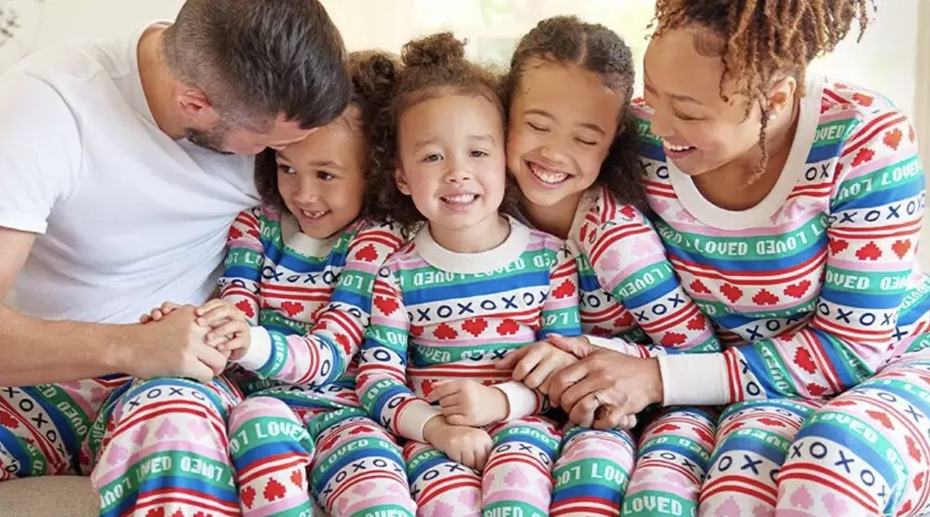family in matching valentine's day pajamas