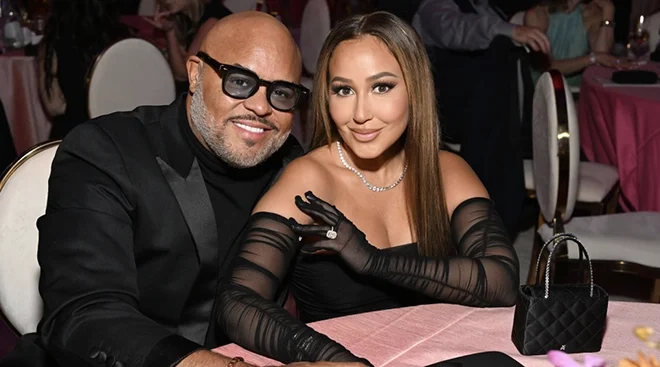 Israel Houghton and Adrienne Bailon attend the Elton John AIDS Foundation's 30th Annual Academy Awards Viewing Party on March 27, 2022 in West Hollywood, California