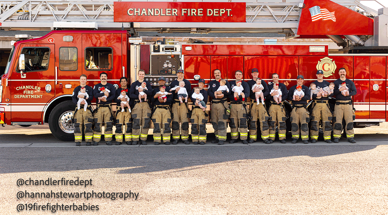 chandler fire department firefighters posing with their babies in front of a fire truck