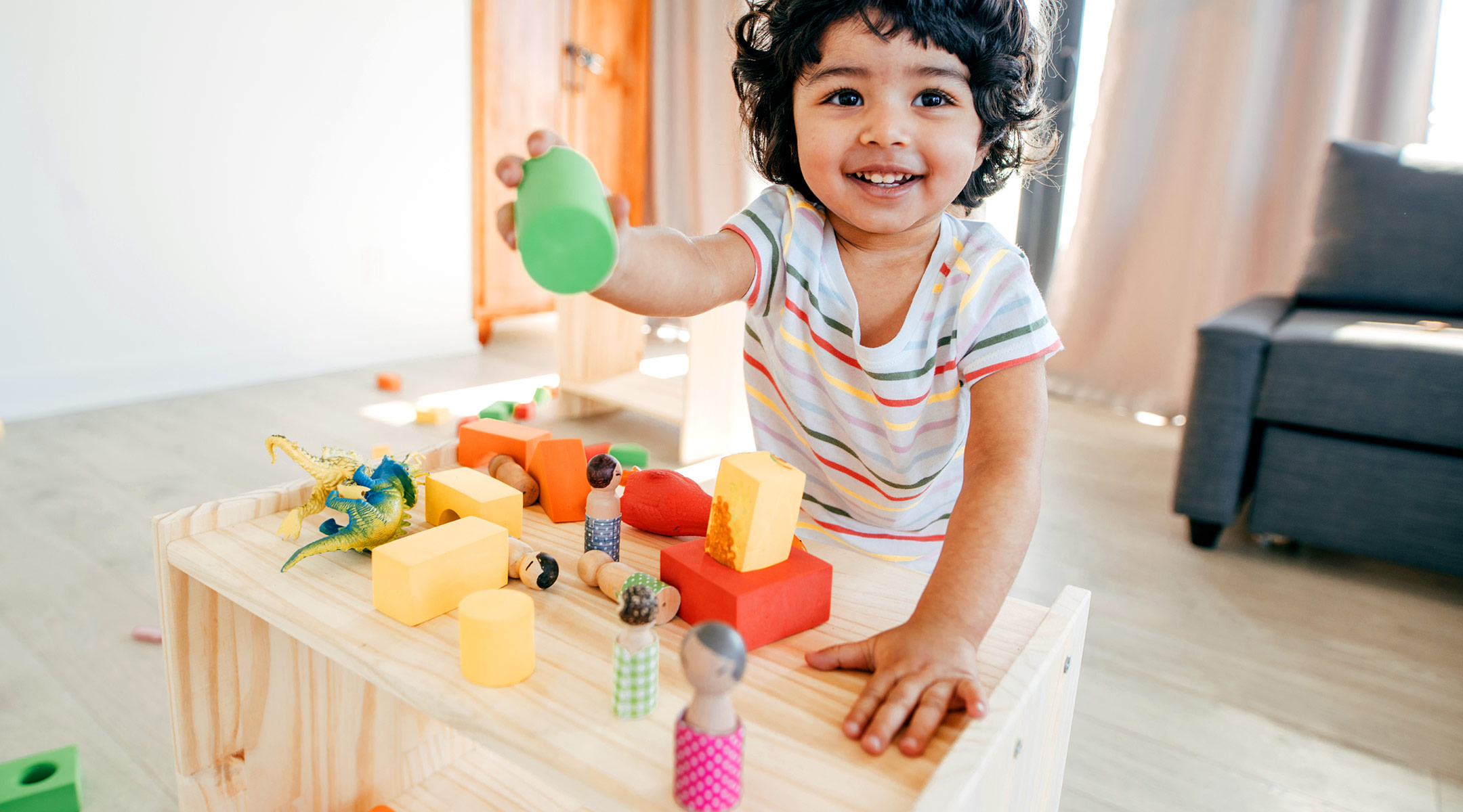 toddler playing stem toy blocks