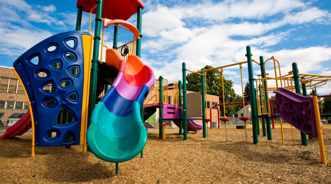 empty playground with slide at preschool