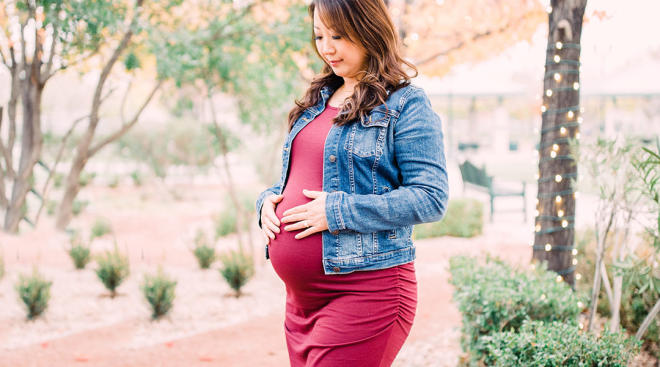 pregnant woman wearing stylish maternity clothes