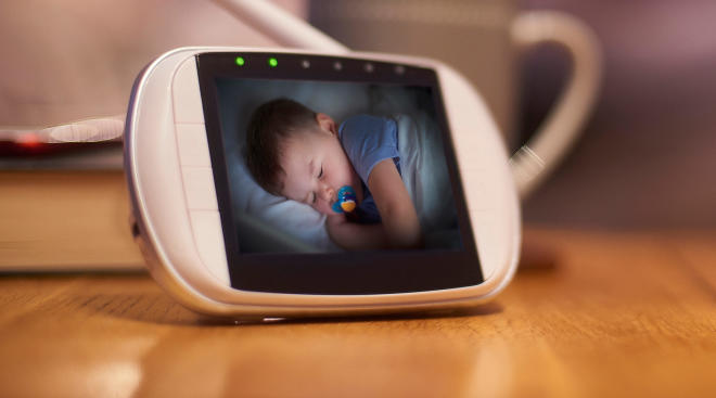 video baby monitor showing sleeping baby