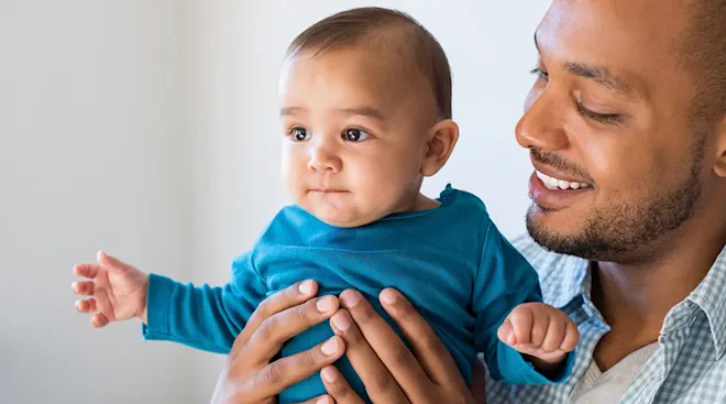 dad and baby at home