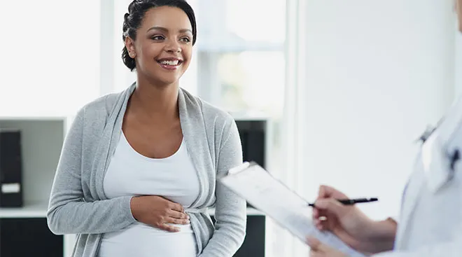 Pregnant mother doing glucose screening and glucose tolerance test