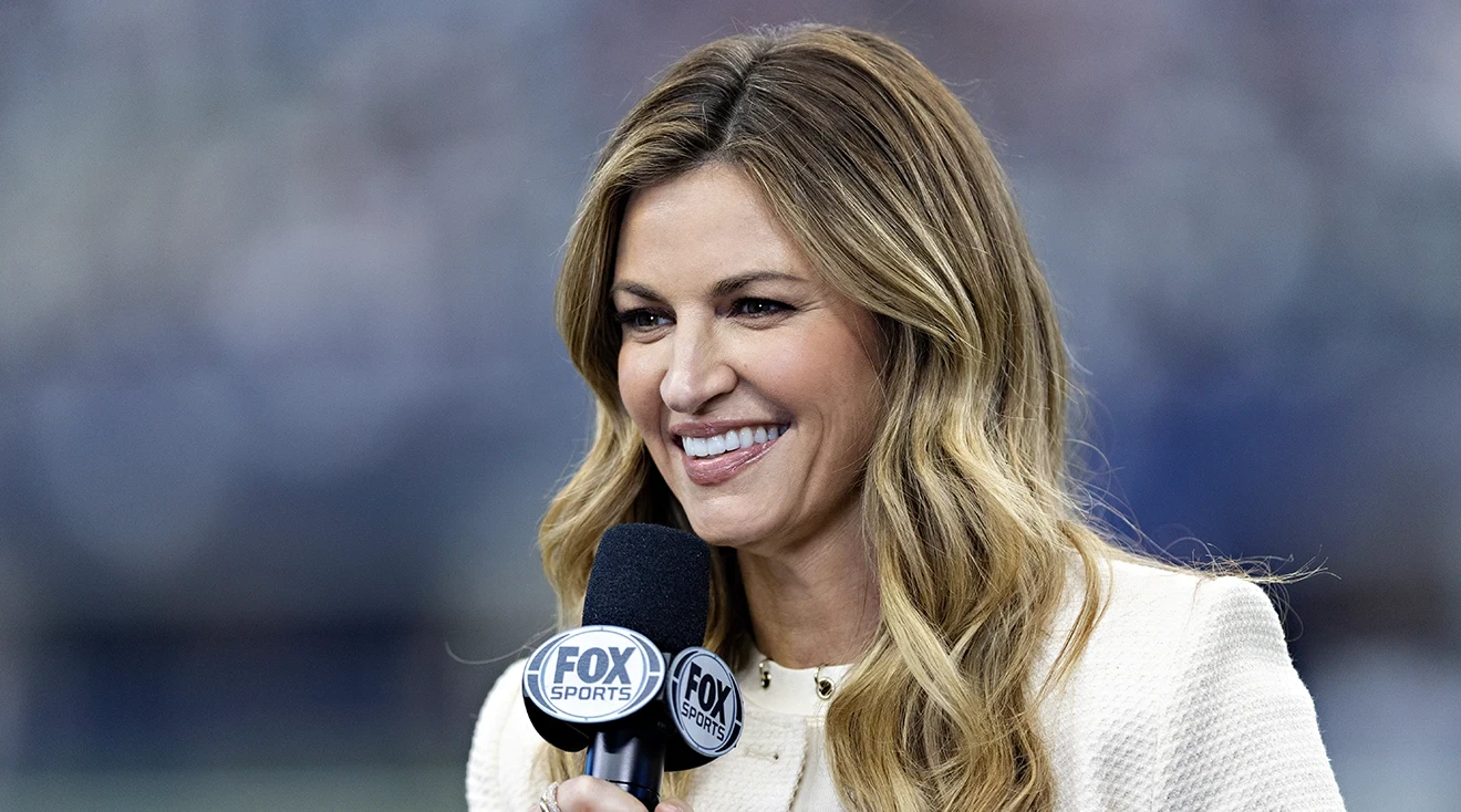 Fox Sports sideline reporter Erin Andrews on the field before a game between the Washington Commanders and the Dallas Cowboys at AT&T Stadium on October 2, 2022 in Arlington, Texas.