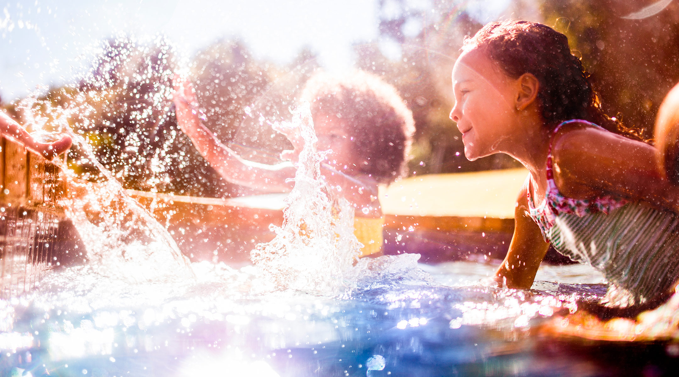 kids playing in pool at all inclusive family resort