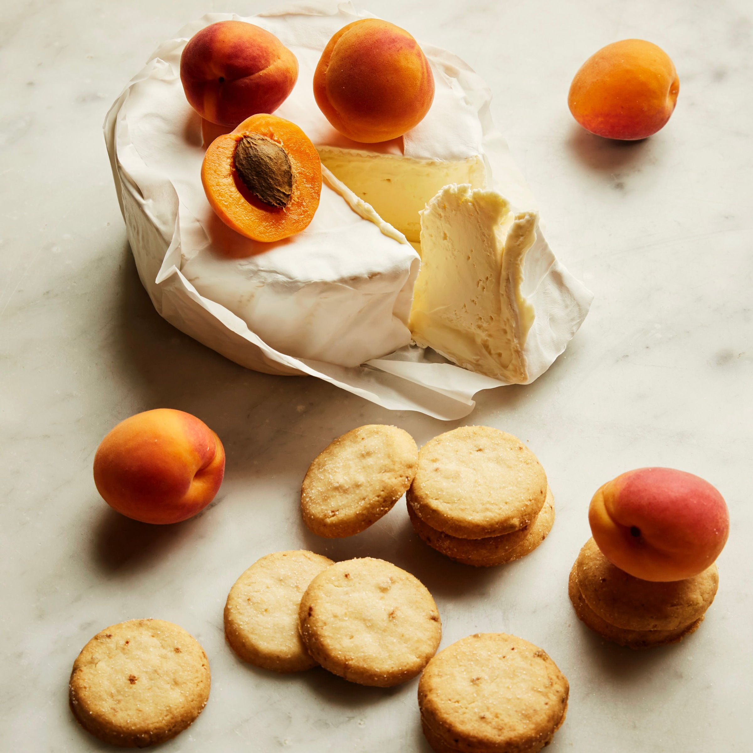 The Fine Cheese Co.: Brillat-Savarin with own-brand biscuits (finecheese.co.uk product photo)