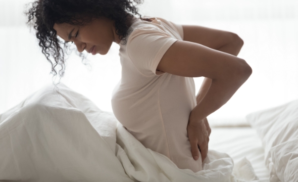 BackPain Before And During Periods: Causes And Treatments!