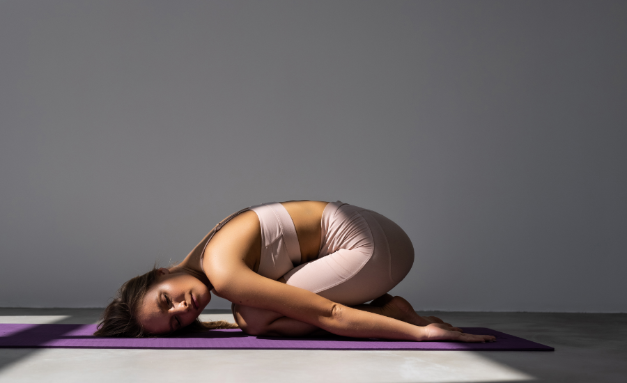 10 Yoga Poses & Stretches for Period Cramps – StrongTek