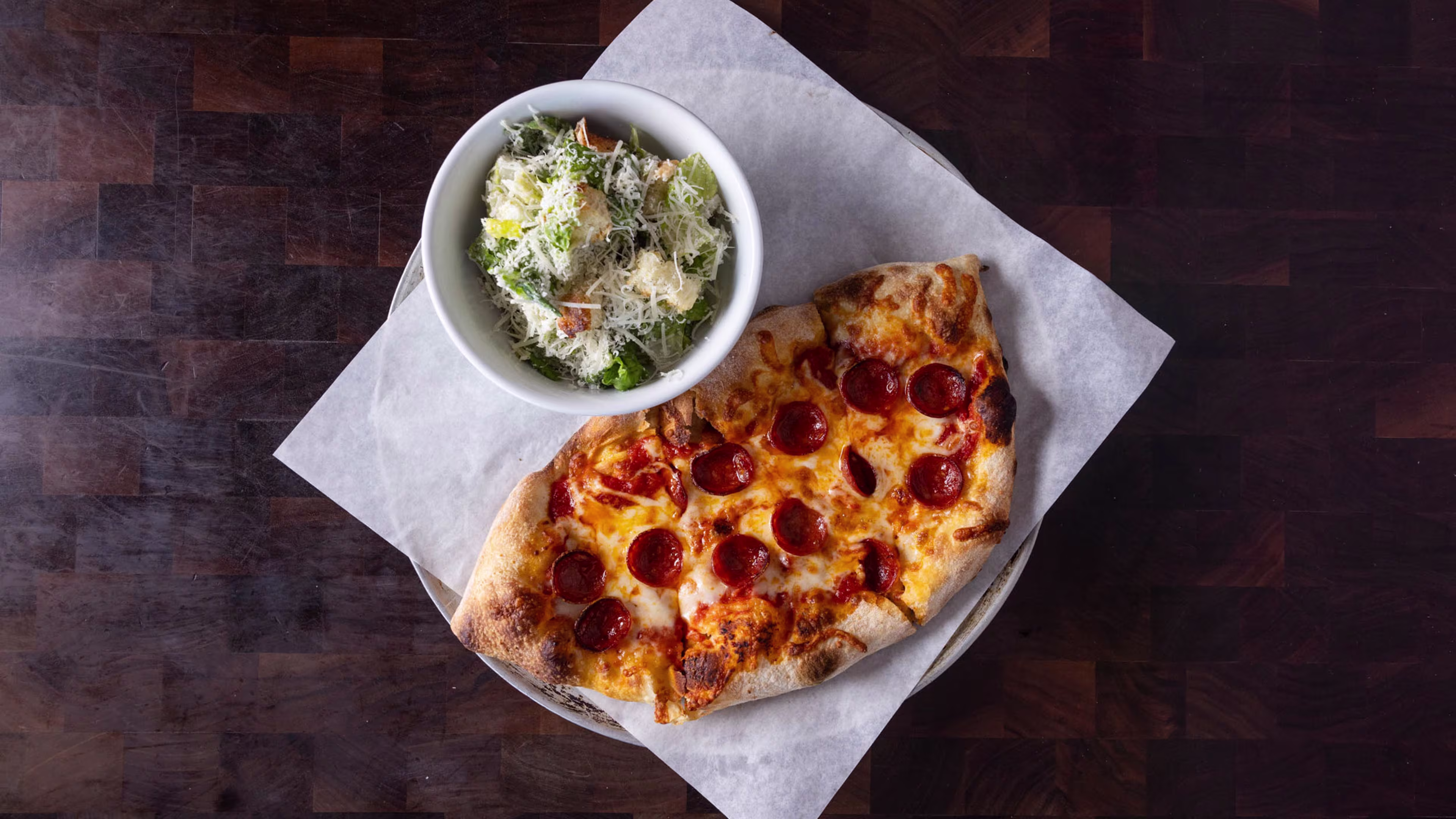 A double Down Size pizza and a half caesar salad