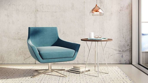 blue chair next to window with mounted light