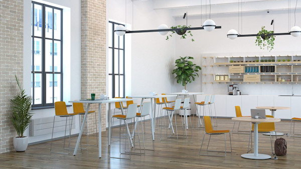collaborative breakroom seating in a modern office common area