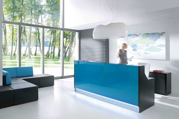 blue modern office furniture design in a reception area with a modern recpetion desk and lounge seating