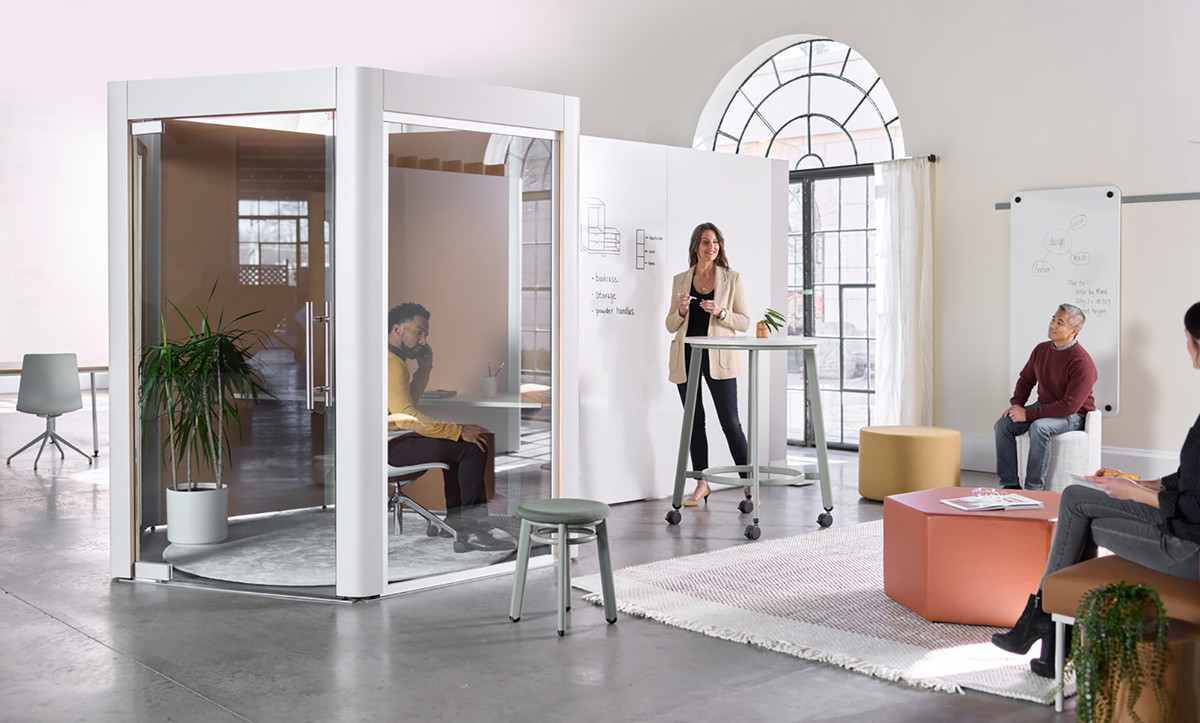 movable office furniture with employee phone booths and mobile partitions in a modern office