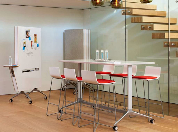 office color psychology in a conference room with a mobile conference table and movable acoustic partitions