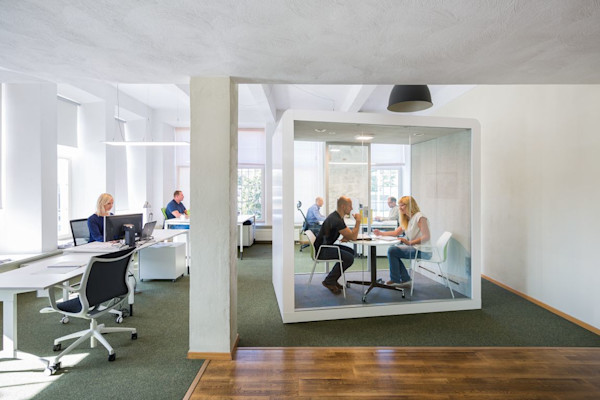 multi purpose office phone booth in an open office floor plan for privacy and collaboration