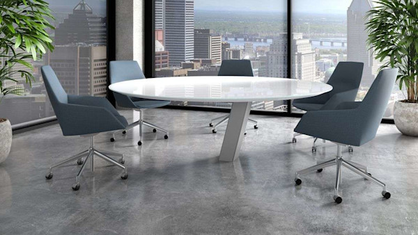 conference table in a modern office with a biophilic design and natural light 