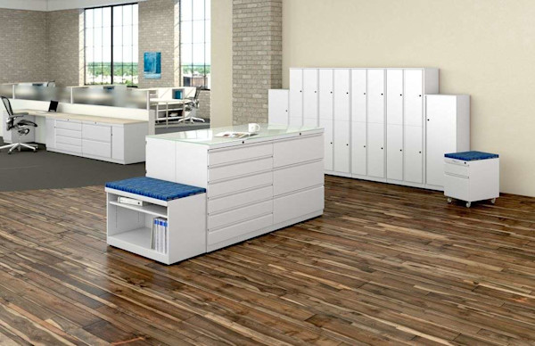Multiple white office storage solutions for a modern office with lots of space.
