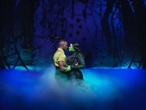 Production shot of Wicked in London with Ryan Reid as Fiyero and Alexia Khadime as Elphaba.