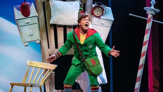 Production shot of ELF the Musical in London, with Matthew Wolfenden as Buddy the Elf.
