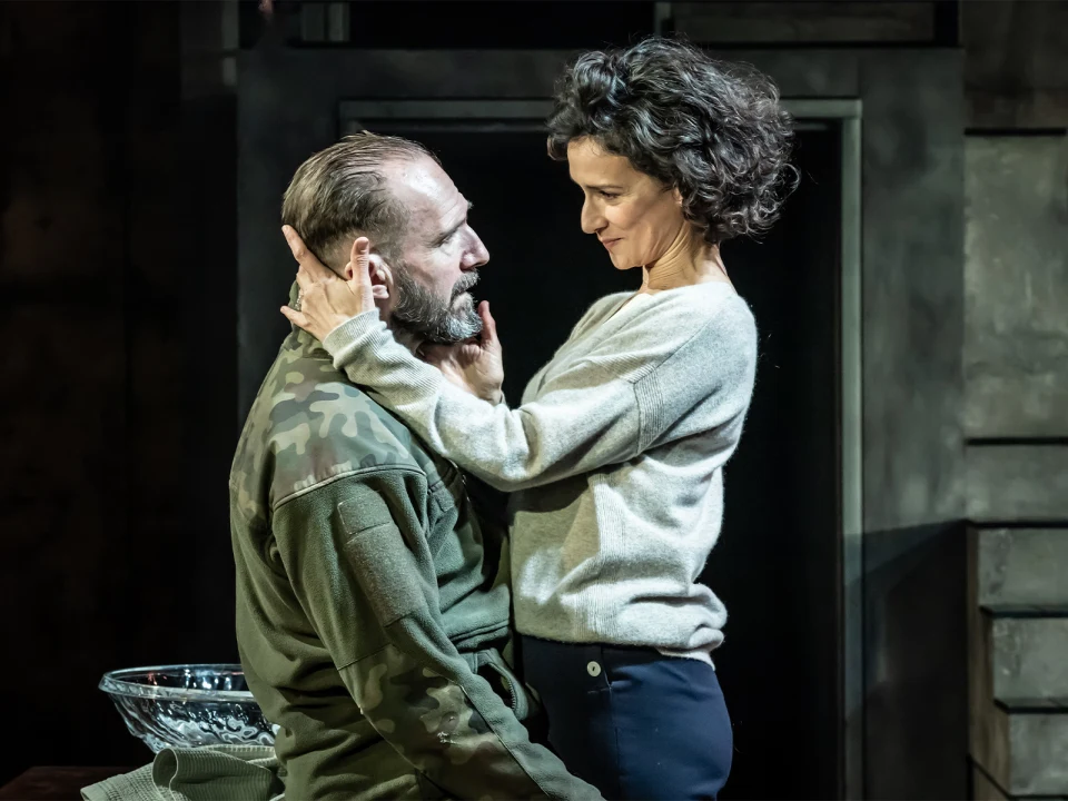 Production shot of Macbeth in London, with Ralph Fiennes as Macbeth and Indira Varma as Lady Macbeth. 