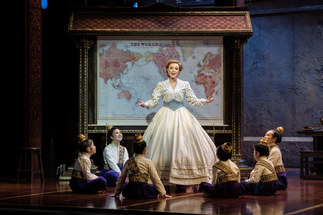 Production shot of The King and I in London, with Helen George as Anna Leonowens.