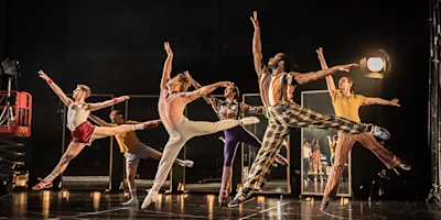 Production Image of A Chorus Line in Leicester Curve from 2021, featuring the full cast ensemble in character as Broadway dancers auditioning