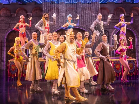 Production shot of Spamalot in New York, with James Monroe Iglehart as King Arthur.