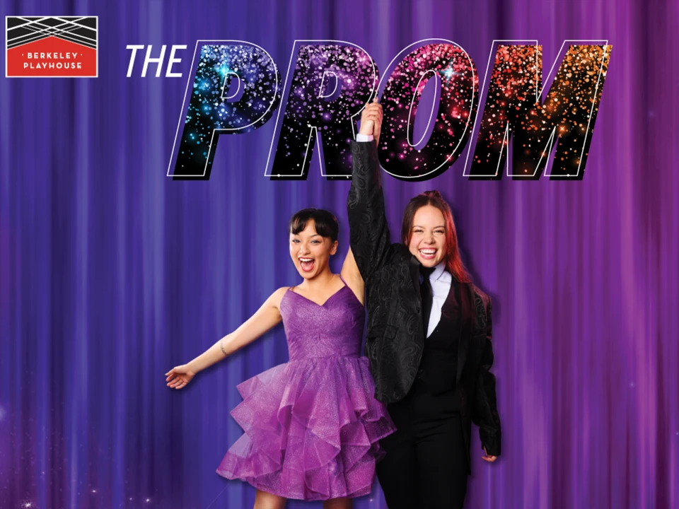 Two people celebrate under the colorful title "The Prom" with one person in a purple dress and the other in a black suit, holding hands and raising one arm. The Berkeley Playhouse logo is in the corner.