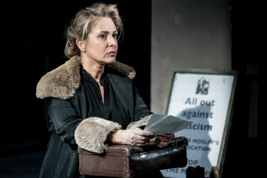 Production image of The Merchant of Venice in London, featuring Tracy Ann Oberman as Shylock.