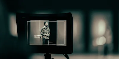 Photo credit: Man being filmed for theatre stream (Photo by Matthew Ball on Unsplash)