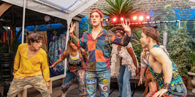 Ryan Anderson as Pippin, center, and the cast of Pippin (Photo by Bonnie Britain Photography)